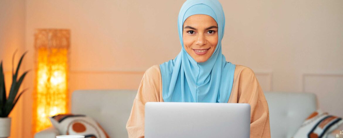 front-view-smiley-woman-wearing-hijab-scaled (1)